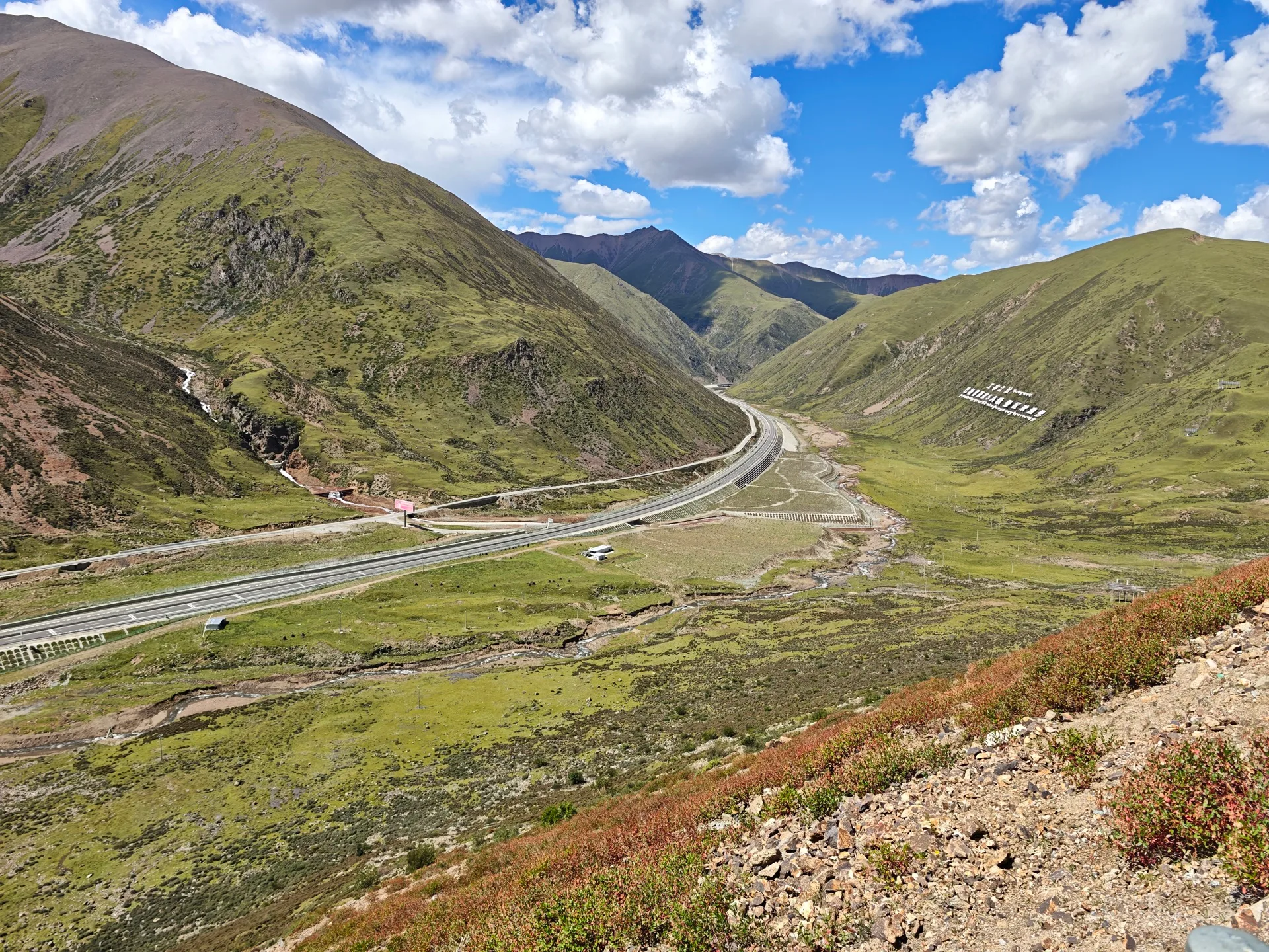 Bicycle and mountain valley on the Sichuan–Tibet Highway