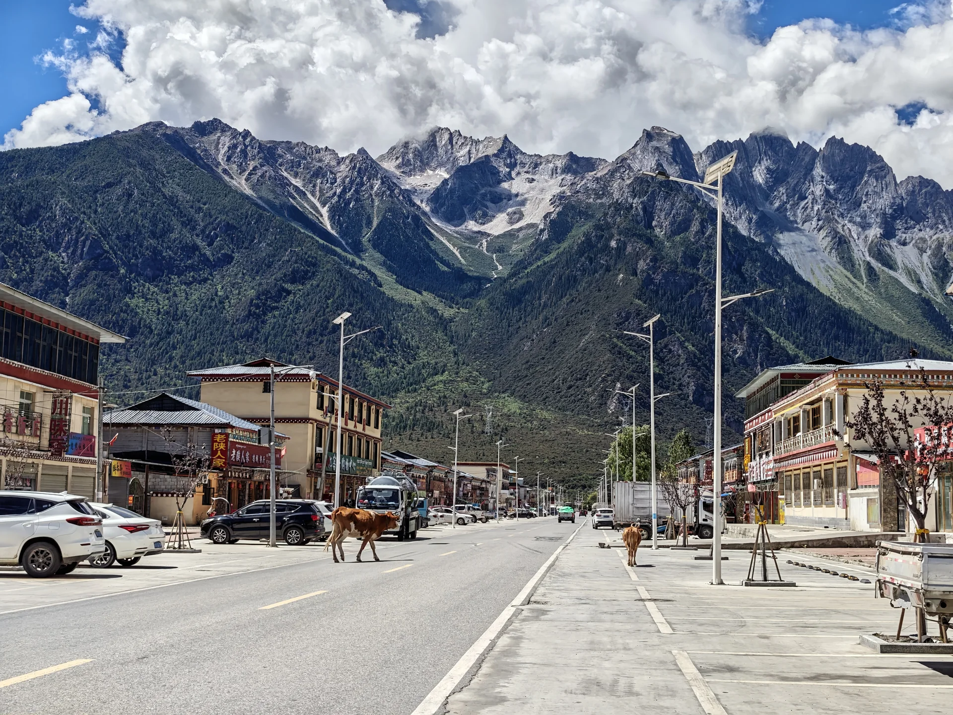 A mountain town beneath snow-covered peaks