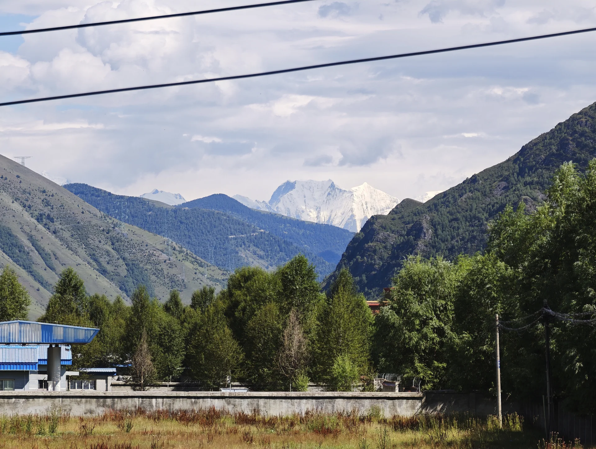 A mountain river valley seen from the road