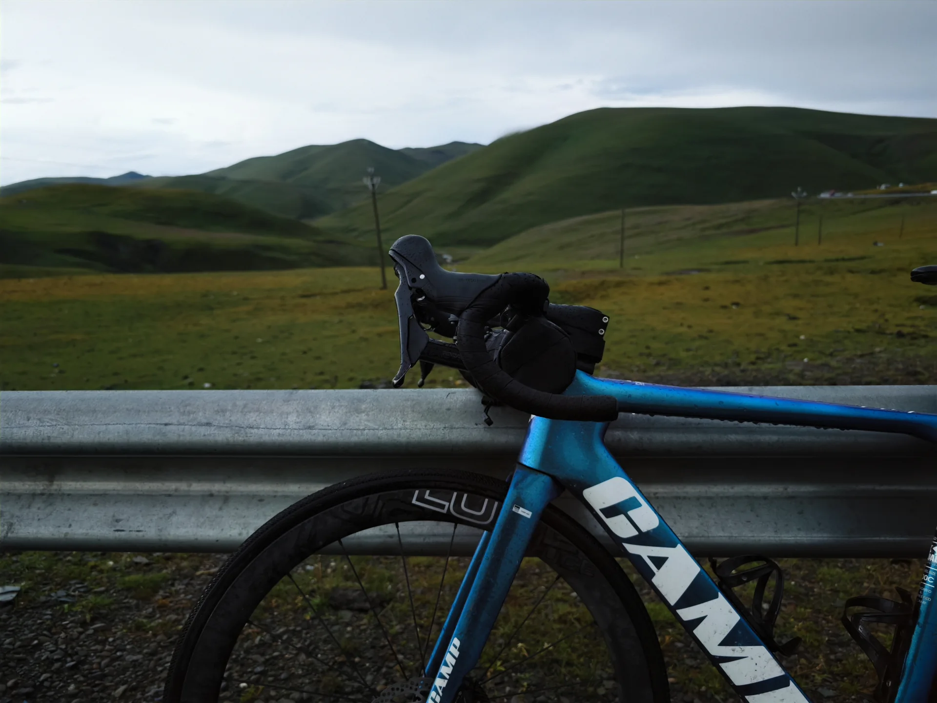 A touring bicycle on a quiet highland road