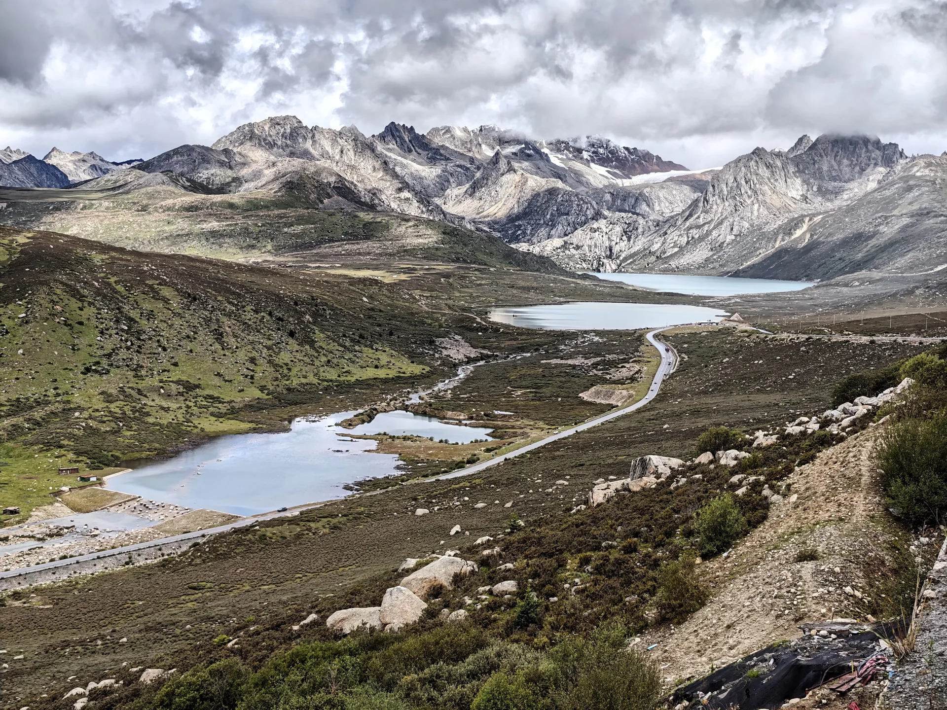 A braided river winding through a high alpine valley