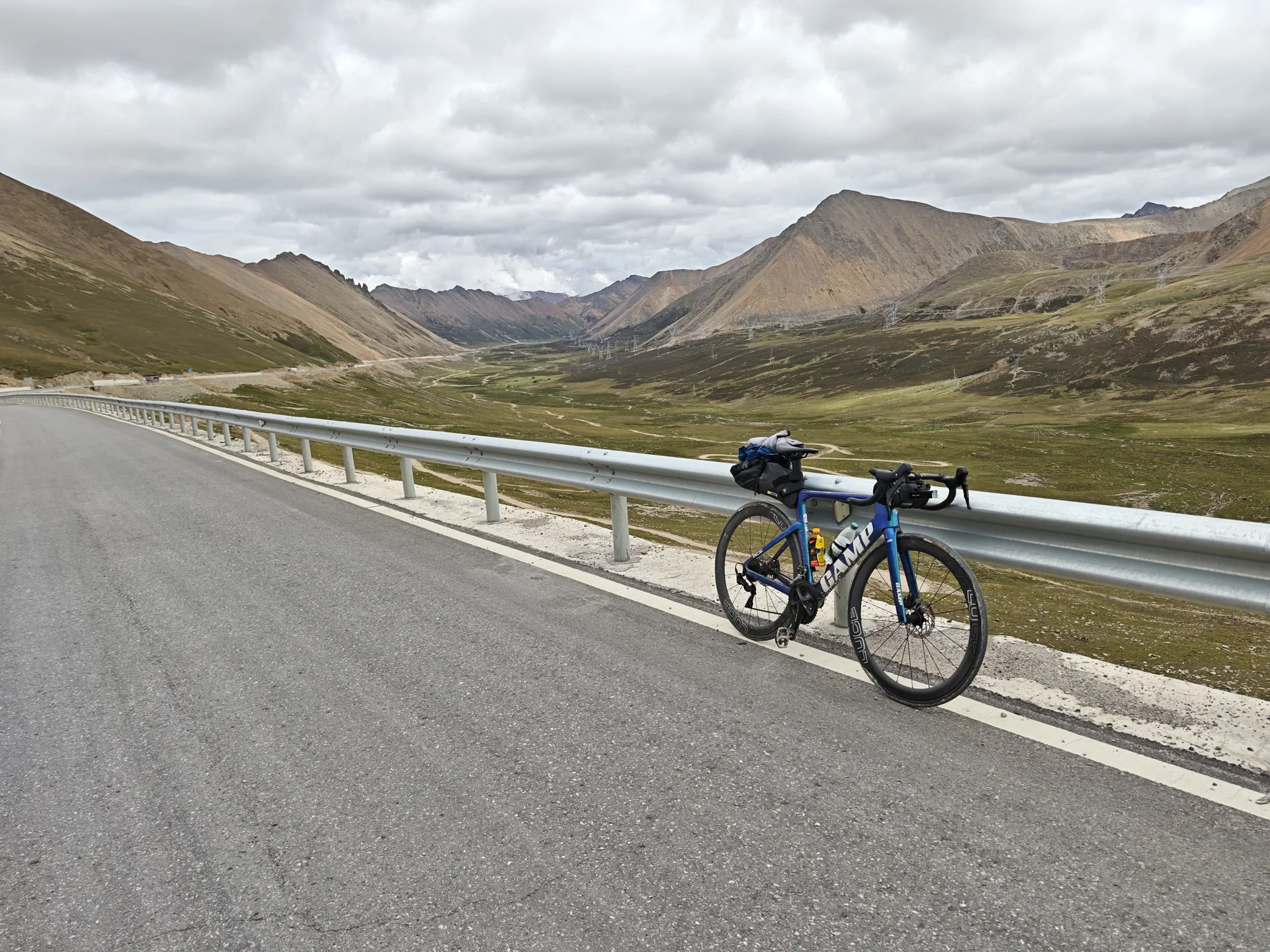 A touring bicycle on a high mountain road